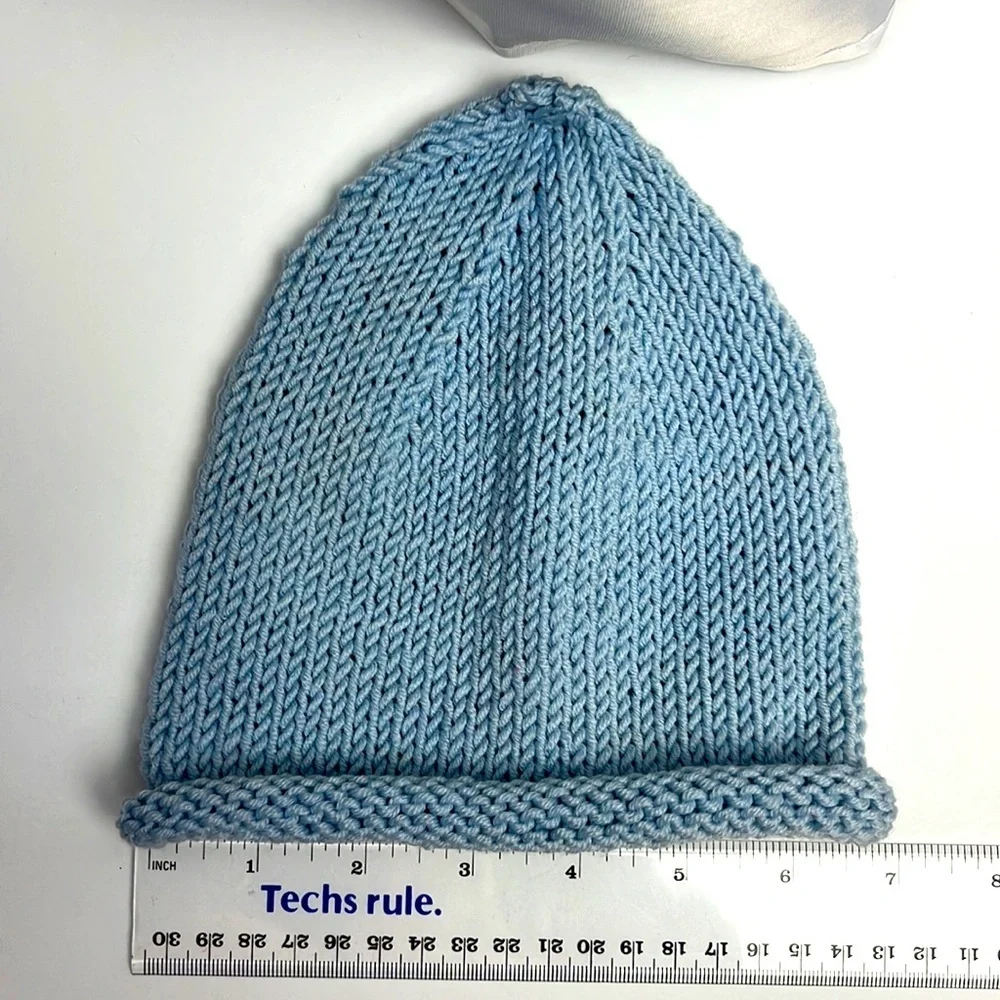 One of a kind gift. Lorraine hand knitted baby hats. NEW. 1620